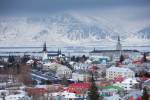 REYKJAVIK, SOUTH ICELAND: The capital city of Reykjavik with traditional bright coloured rooves and snow-covered glacier mountains, Iceland. (Photo by Tim Graham/Getty Images)