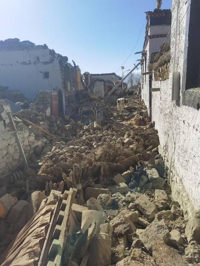 CHINA-NEPAL-QUAKE This handout received on January 7, 2025 shows damaged houses in Shigatse, southwestern China's Tibet region, after an earthquake hit the area. A devastating earthquake in China's remote Tibet region killed at least 53 people and collapsed