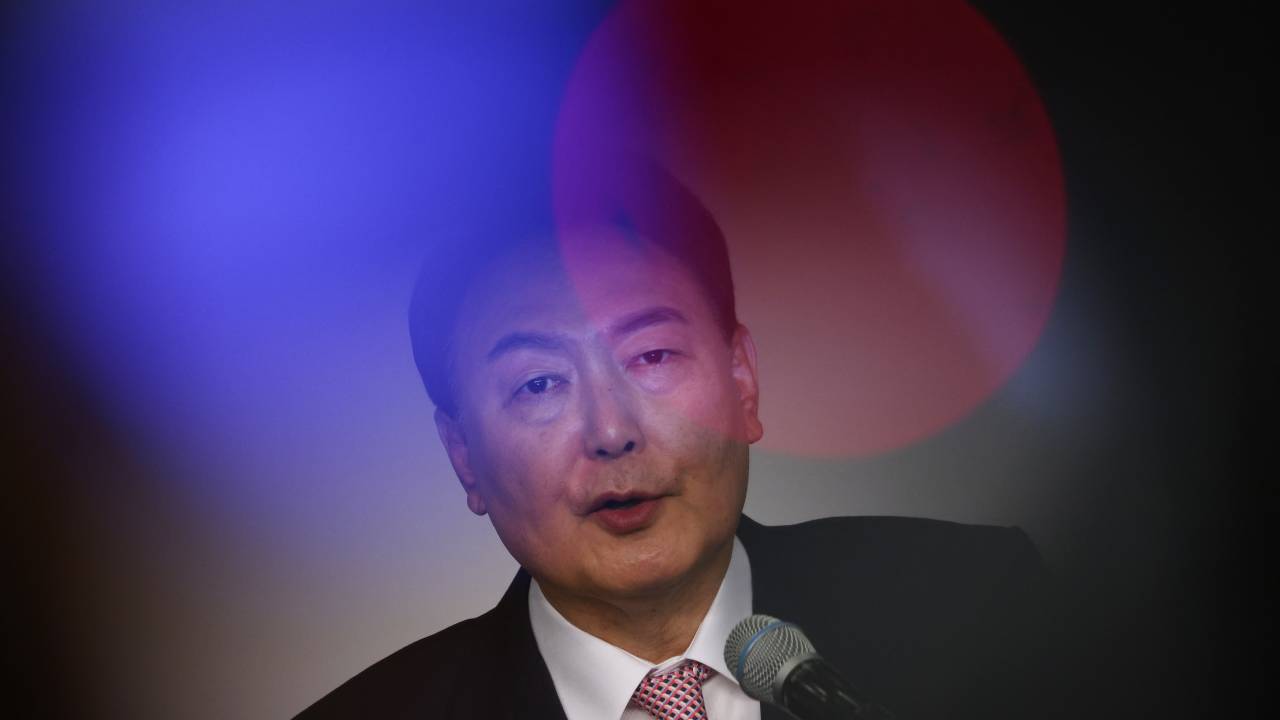 (FILES) South Korea's president-elect Yoon Suk-yeol speaks during a news conference at the National Assembly in Seoul on March 10, 2022, the morning after his victory in the country's presidential election. Impeached South Korean leader Yoon Suk Yeol was arrested on January 15, 2025 over his failed martial law bid, ending a weeks-long standoff with authorities and becoming the first president to be detained in the nation's history. (Photo by KIM HONG-JI / POOL / AFP)