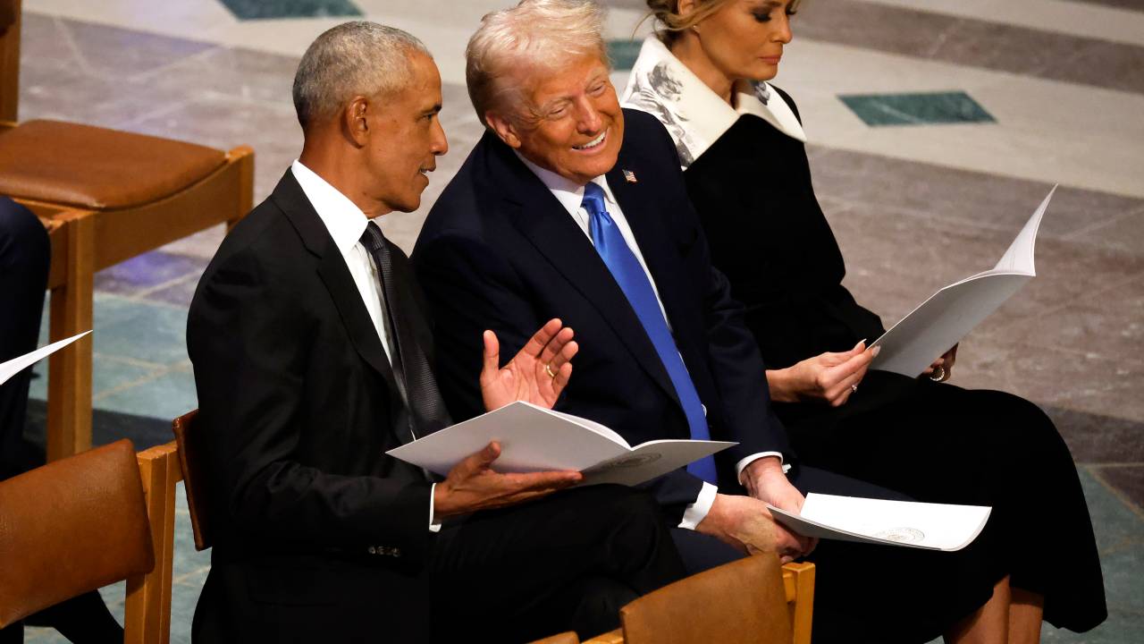 WASHINGTON, DC - JANUARY 09: U.S. President-elect Donald Trump speaks with former U.S. President Barack Obama as Melania Trump looks on during the state funeral for former U.S. President Jimmy Carter at Washington National Cathedral on January 09, 2025 in Washington, DC. President Joe Biden declared today a national day of mourning for Carter, the 39th President of the United States, who died at the age of 100 on December 29, 2024 at his home in Plains, Georgia. (Photo by Chip Somodevilla/Getty Images)