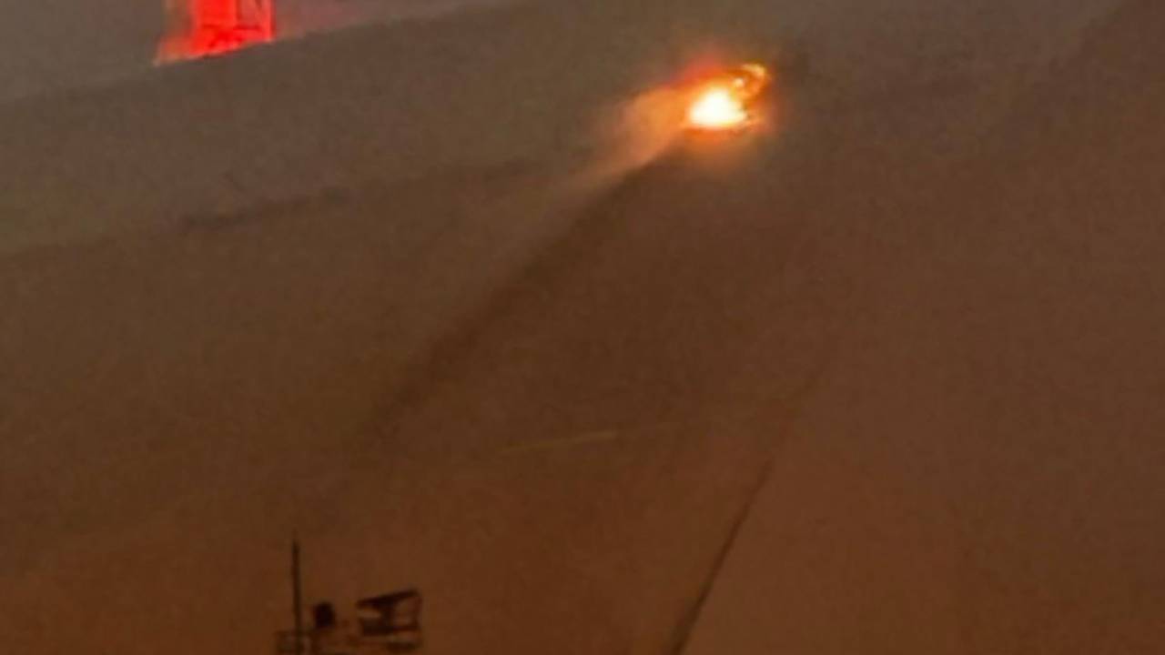 A handout images taken from the X account of the International Atomic Energy Agency (IAEA) on February 14, 2025 shows a glow after an UAV apparently had struck the roof at the New Safe Confinement (NSC), which protects the remains of reactor 4 of the former Chornobyl NPP, causing a fire. Ukrainian's president said on February 14, that a Russian drone had struck overnight a cover built to contain radiation at the Chernobyl nuclear power plant, adding that "radiation levels have not increased". (Photo by Handout / International Atomic Energy Agency (IAEA) / AFP) / RESTRICTED TO EDITORIAL USE - MANDATORY CREDIT "AFP PHOTO /International Atomic Energy Agency (IAEA) " - NO MARKETING NO ADVERTISING CAMPAIGNS - DISTRIBUTED AS A SERVICE TO CLIENTS