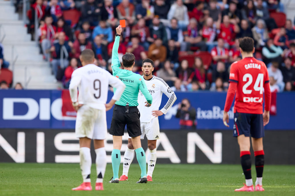 PAMPLONA, SPAIN - FEBRUARY 15: Jude Bellingham of Real Madrid CF receives a red card during the LaLiga EA Sports match between CA Osasuna and Real Madrid CF at Estadio El Sadar on February 15, 2025 in Pamplona, Spain. (Photo by Ion Alcoba Beitia/Getty Images)