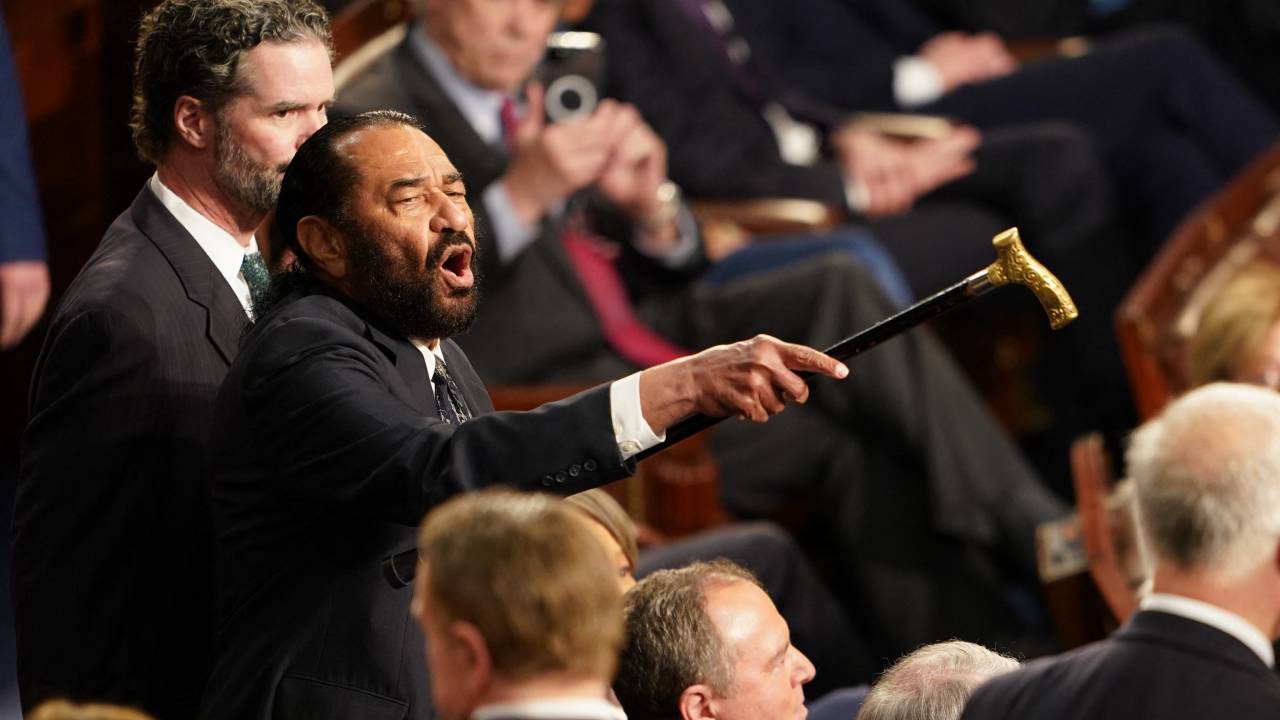 US Representative Al Green (D-TX) (L) disrupts US President Donald Trump as he addressed to a joint session of Congress at the US Capitol in Washington, DC, on March 4, 2025. (Photo by ALLISON ROBBERT / AFP)