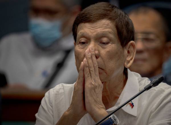 MANILA, PHILIPPINES - OCTOBER 28: Former Philippine President Rodrigo Duterte appears before lawmakers at the Senate on October 28, 2024 in Pasay, Metro Manila, Philippines. Former President Rodrigo Duterte appeared before lawmakers to answer questions about his administration’s war on drugs, marking his first appearance in any investigation on the matter. In 2016, Duterte launched a "war" on drugs, which human rights groups estimate has resulted in over 30,000 deaths and prompted an investigation by the International Criminal Court (ICC) for alleged crimes against humanity. (Photo by Ezra Acayan/Getty Images)