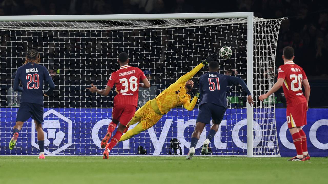 PARIS, FRANCE - MARCH 05: Alisson Becker of Liverpool makes a save during the UEFA Champions League 2024/25 Round of 16 first leg match between Paris Saint-Germain and Liverpool FC at Parc des Princes on March 05, 2025 in Paris, France. (Photo by Julian Finney/Getty Images)
