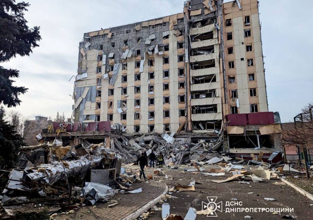 KRYVYI RIH, UKRAINE - MARCH 12: (----EDITORIAL USE ONLY - MANDATORY CREDIT - 'STATE EMERGENCY SERVICE OF UKRAINE / HANDOUT' - NO MARKETING NO ADVERTISING CAMPAIGNS - DISTRIBUTED AS A SERVICE TO CLIENTS---- ) A view of the damage after Russian troops launched a missile strike, damaging an infrastructure facility and increasing the number of victims to 9 on Kryvyi Rih, Ukraine on March 12, 2025. During efforts to eliminate the consequences of the attack, Russia struck again, damaging 2 rescue vehicles. The attack caused a fire in 3 garages and 4 cars, covering an area of 100 sq.m. Additionally, multi-storey residential buildings, administrative buildings, a shop, and 12 cars were also damaged. (Photo by State Emergency Service of Ukraine/Anadolu via Getty Images)