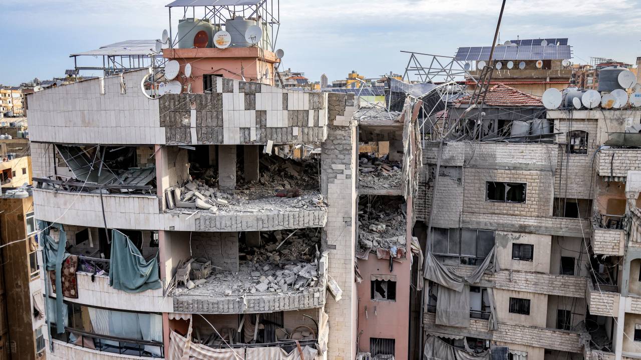 A heavily-damaged rooftop of a building is pictured at the site of an Israeli strike on a building in Beirut's southern suburbs on April 1, 2025. An Israeli strike on south Beirut killed at least three people on April 1, Lebanon said after Israel announced its second such strike in a fragile four-month ceasefire between Israel and Hezbollah. The attack came without warning at around 3:30 am (0030 GMT) during the Eid al-Fitr Muslim holiday marking the end of the Ramadan fasting period. (Photo by Ibrahim AMRO / AFP)