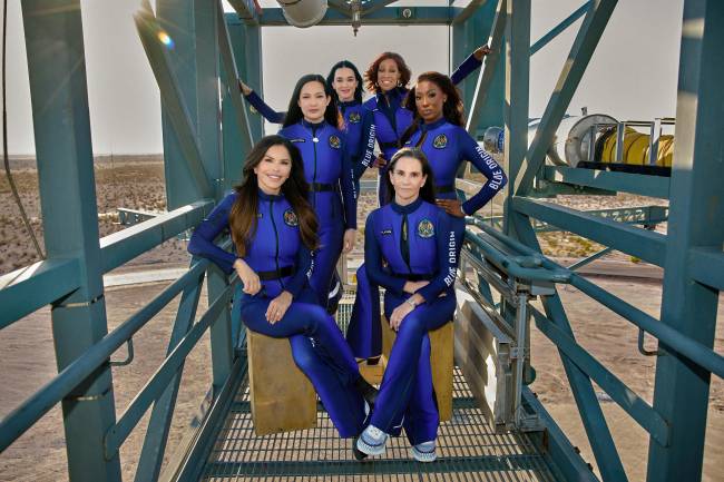 US-SPACE-BLUEORIGIN A handout photo published on April 14, 2025 on the X account of Blue Origin, shows (clockwise from L) US entrepreneur Lauren Sanchez, former NASA scientist Amanda Nguyen, singer Katy Perry, TV presenter Gale King, former NASA scientist Aisha Bowe and film producer Kerianne Flynn posing in their space suits ahead of the all-woman sub-orbital mission aboard the New Shepard rocket. (Photo by X ACCOUNT OF BLUE ORIGIN / AFP) / RESTRICTED TO EDITORIAL USE - MANDATORY CREDIT