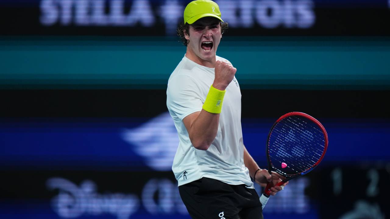 MIAMI GARDENS, FLORIDA - MARCH 24: Joao Fonseca of Brazil reacts against Alex de Minaur of Australia during their match on day 7 of the Miami Open at Hard Rock Stadium on March 24, 2025 in Miami Gardens, Florida.