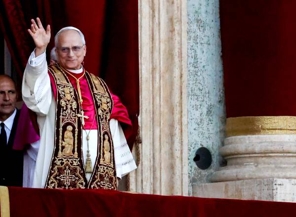 Pope Leo XIV appears on the balcony of St. Peter's Basilica, after becoming the first American pope, in Vatican City, Italy, on Thursday, May 8, 2025. Cardinal Robert Francis Prevost of the US was elected as the head of the Catholic Church on the second day of voting in the Vatican.