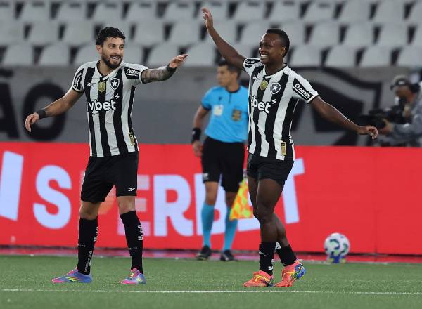 RIO DE JANEIRO, BRAZIL - MAY 11: Alex Telles (L) of Botafogo celebrates after scoring the fourth goal of his team with teammate Nathan Fernandes during the match between Botafogo and Internacional as part of Brasileirao 2025 at Estadio Olimpico Nilton Santos on May 11, 2025 in Rio de Janeiro, Brazil. (Photo by Wagner Meier/Getty Images)