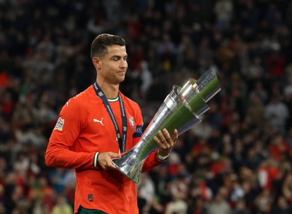 MUNICH, GERMANY - JUNE 08: Cristiano Ronaldo of Portugal holds the UEFA Nations League trophy after his team's victory in during the UEFA Nations League 2025 final match between Portugal and Spain at Munich Football Arena on June 08, 2025 in Munich, Germany. (Photo by Alexander Hassenstein/Getty Images)