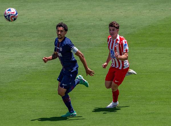 PASADENA, CALIFORNIA - JUNE 15: Marquinhos #5 of Paris Saint-Germain and Julian Alvarez #19 of Atletico de Madrid chase after a ball during the FIFA Club World Cup 2025 group B match between Paris Saint-Germain FC and Club Atletico de Madrid at Rose Bowl on June 15, 2025, in Pasadena, California. (Photo by Seth Greenberg/ISI Photos/ISI Photos via Getty Images)