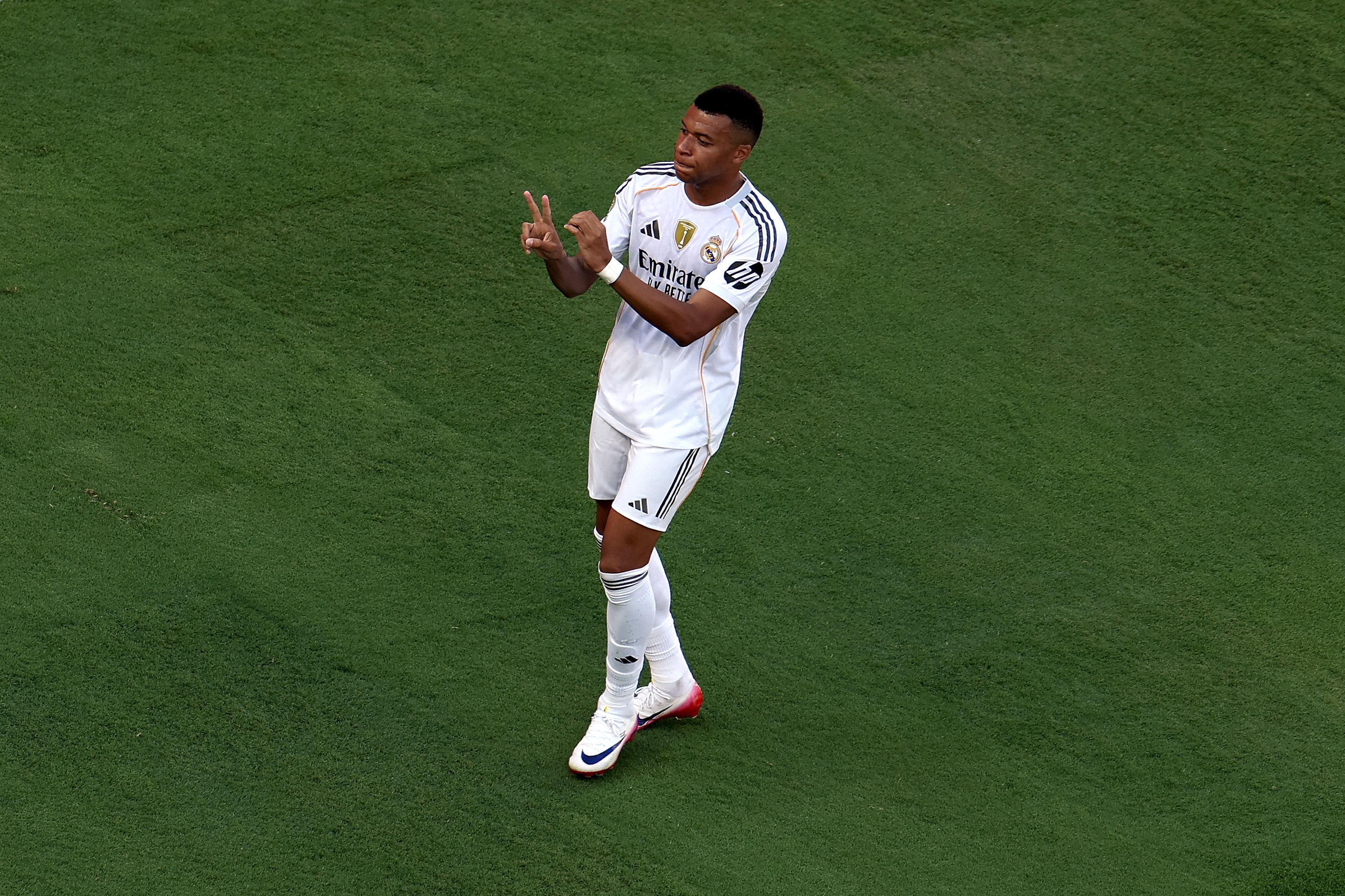 EAST RUTHERFORD, NEW JERSEY - JULY 05: Kylian Mbappe #9 of Real Madrid C.F. celebrates scoring his team's third goal during the FIFA Club World Cup 2025 quarter-final match between Real Madrid CF and Borussia Dortmund at MetLife Stadium on July 05, 2025 in East Rutherford, New Jersey. (Photo by Sandra Montanez/Getty Images)