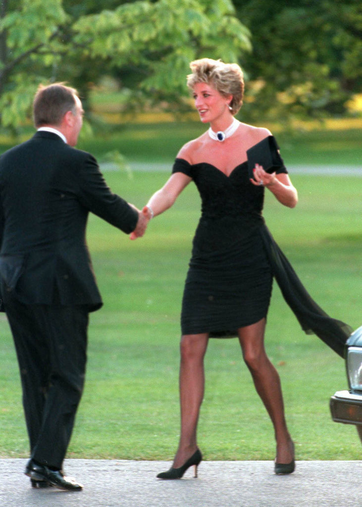 LONDON, UNITED KINGDOM - NOVEMBER 20: Diana, Princess of Wales, wearing a stunning black dress commissioned from Christina Stambolian, attends the Vanity Fair party at the Serpentine Gallery on November 20, 1994 in London, England. The famous black 