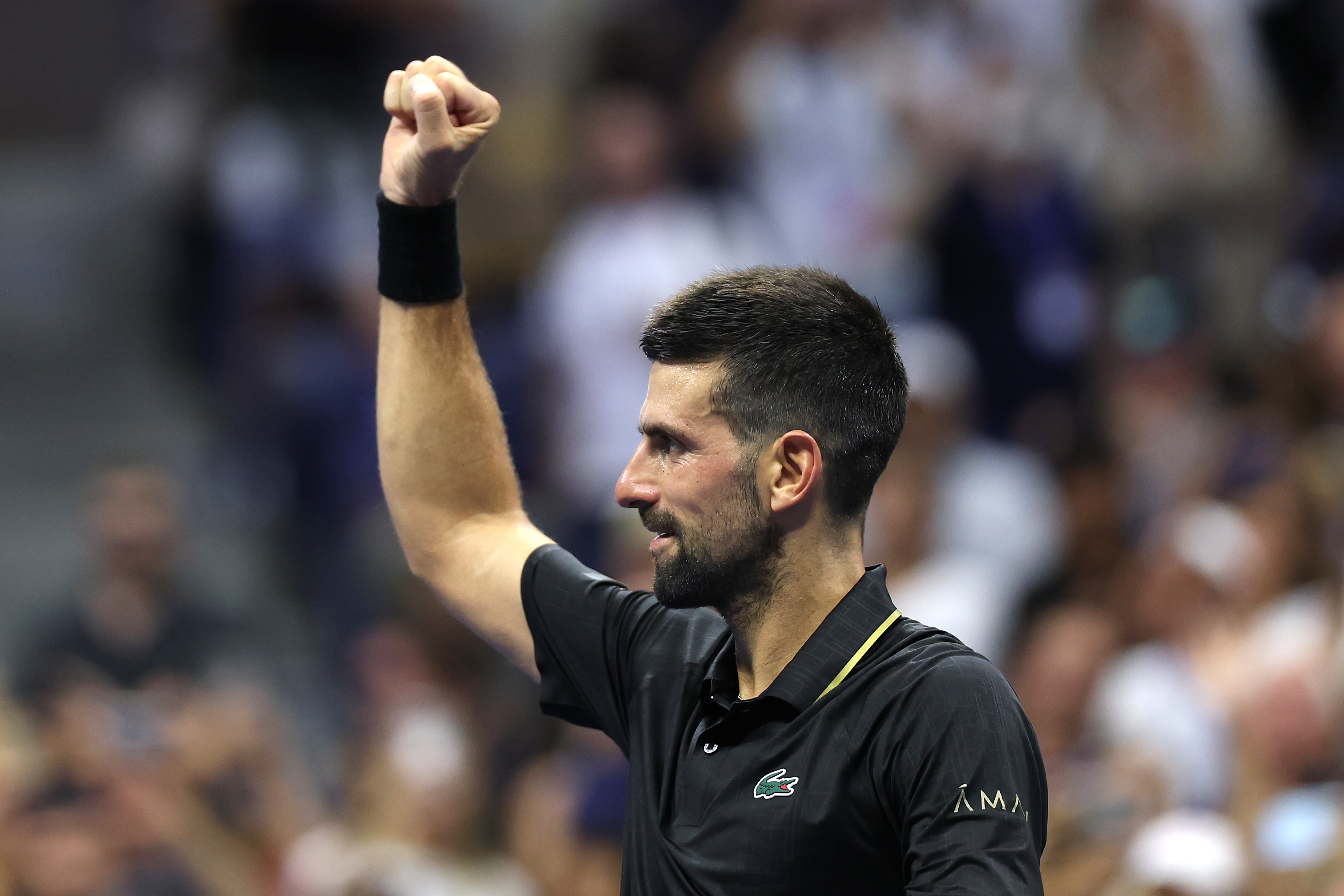 NEW YORK, NEW YORK - AUGUST 24: Novak Djokovic of Serbia celebrates after defeating Learner Tien of the United States during their Men's Singles First Round match on Day One of the 2025 US Open at USTA Billie Jean King National Tennis Center on August 24, 2025 in the Flushing neighborhood of the Queens borough of New York City. (Photo by Clive Brunskill/Getty Images)