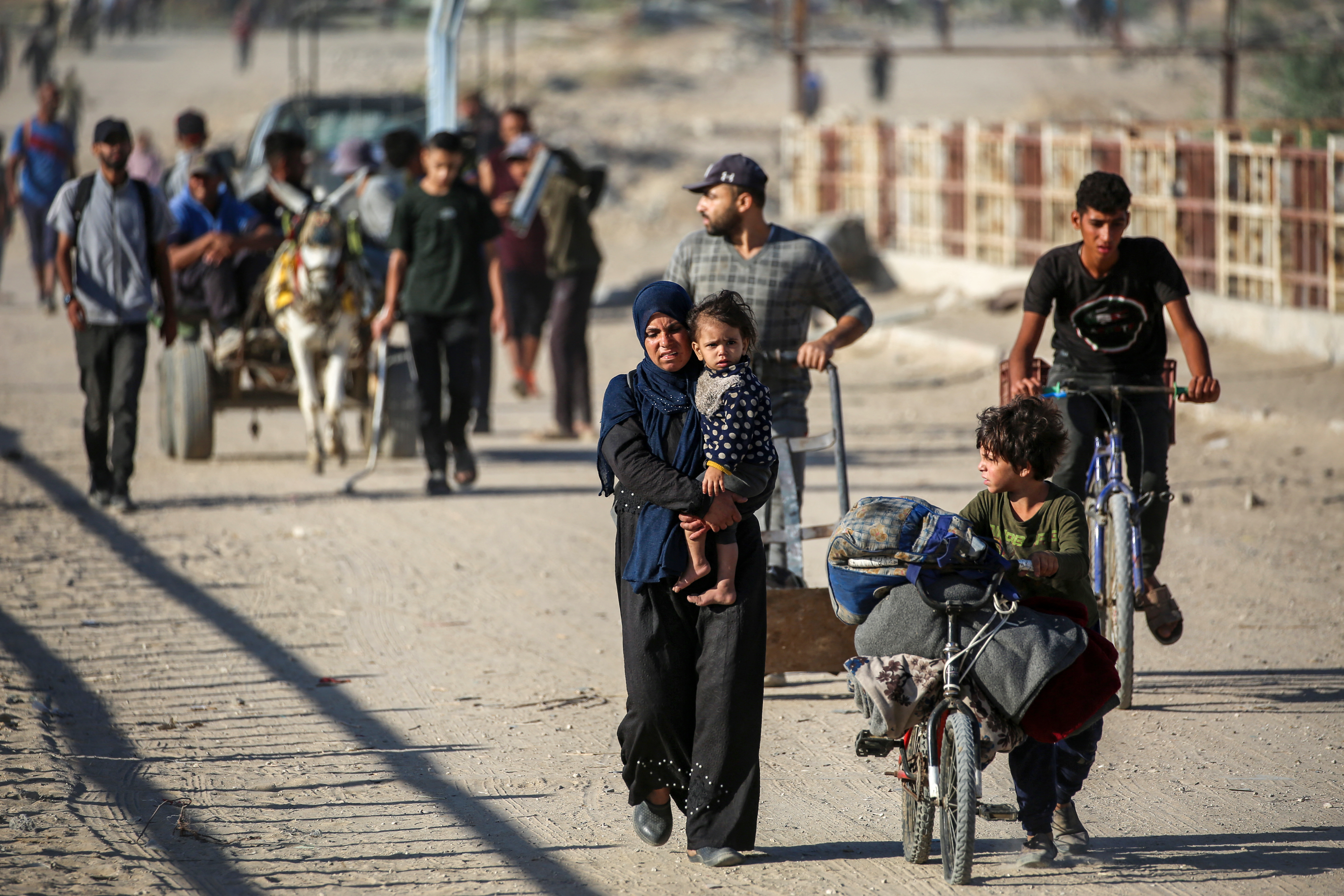 Palestinos voltam para a Cidade de Gaza