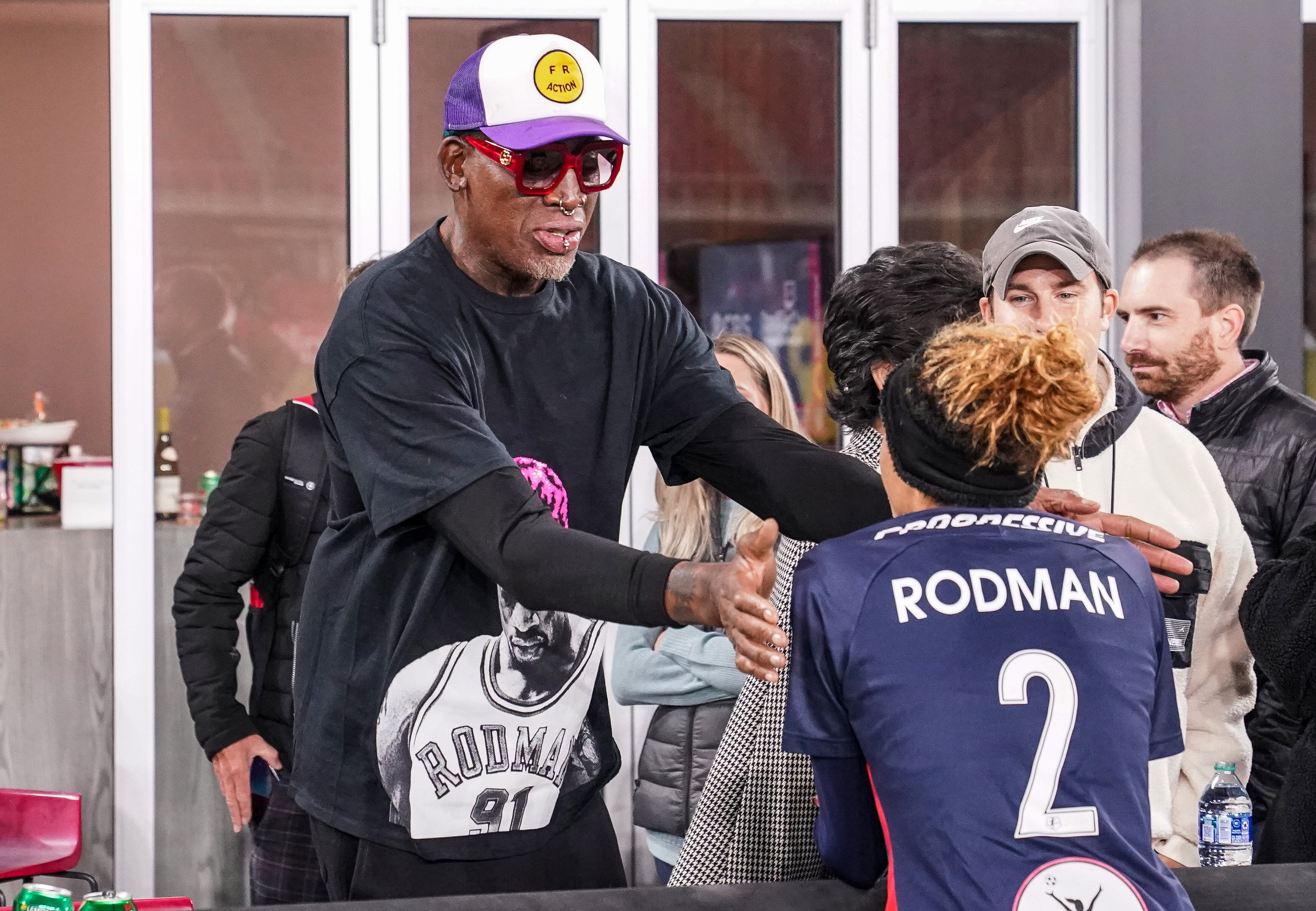 WASHINGTON, DC - NOVEMBER 7: Washington Spirit forward Trinity Rodman (2) with her father basketball legend Dennis Rodman after a game between North Carolina Courage and Washington Spirit at Audi Field on November 7, 2021 in Washington, DC. (Photo by Tony Quinn/ISI Photos/Getty Images)
