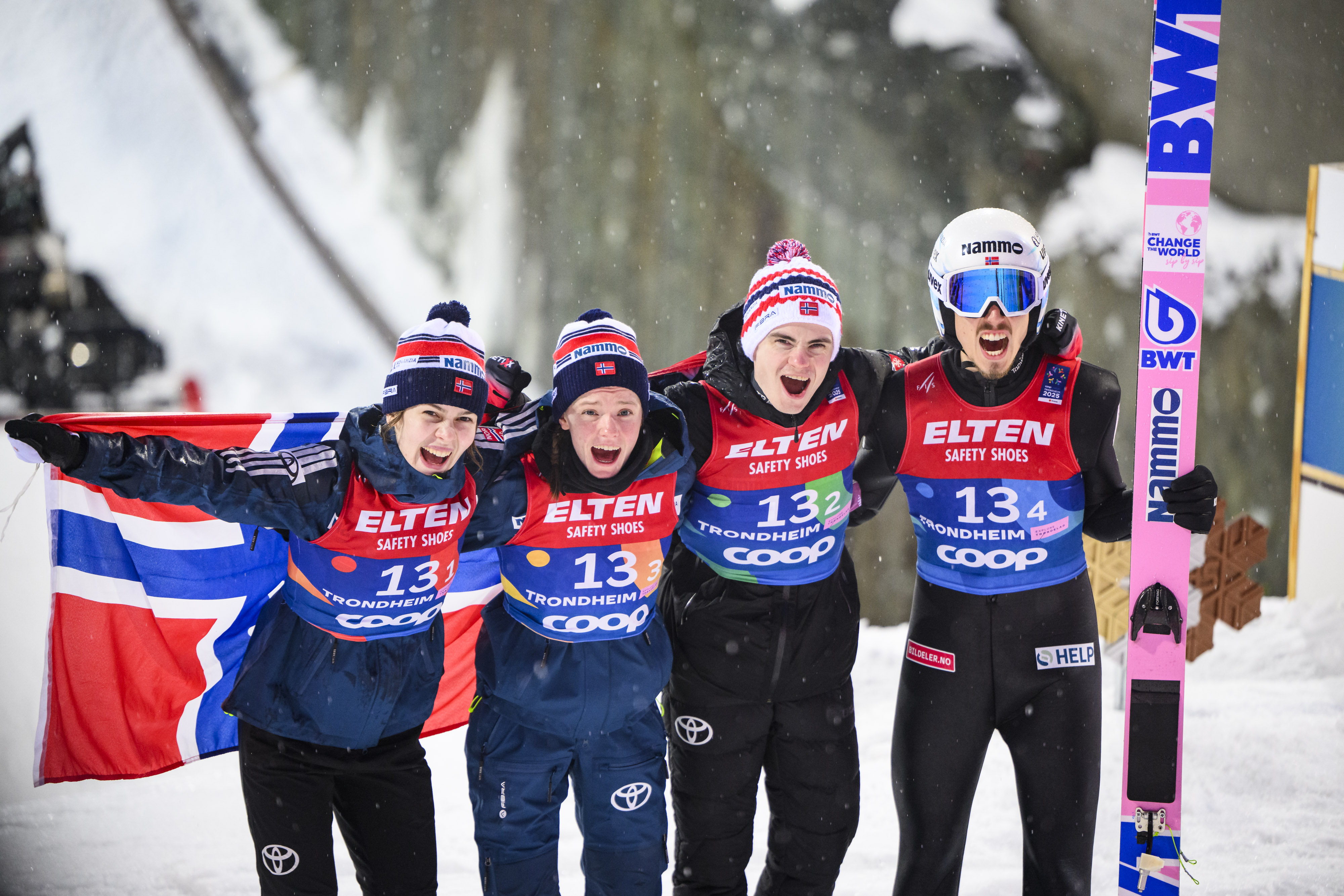TRONDHEIM, NORWAY - MARCH 5: Anna Odine Stroem of Norway, Eirin Maria Kvandal of Norway, Marius Lindvik of Norway, Johann Andre Forfang of Norway celebrate after the second jump during the Mixed Team HS 138 Ski Jumping Competition at the FIS World Ski Championships Trondheim at Granasen Skisenter on March 5, 2025 in Trondheim, Norway. (Photo by Christian Bruna/VOIGT/GettyImages)
