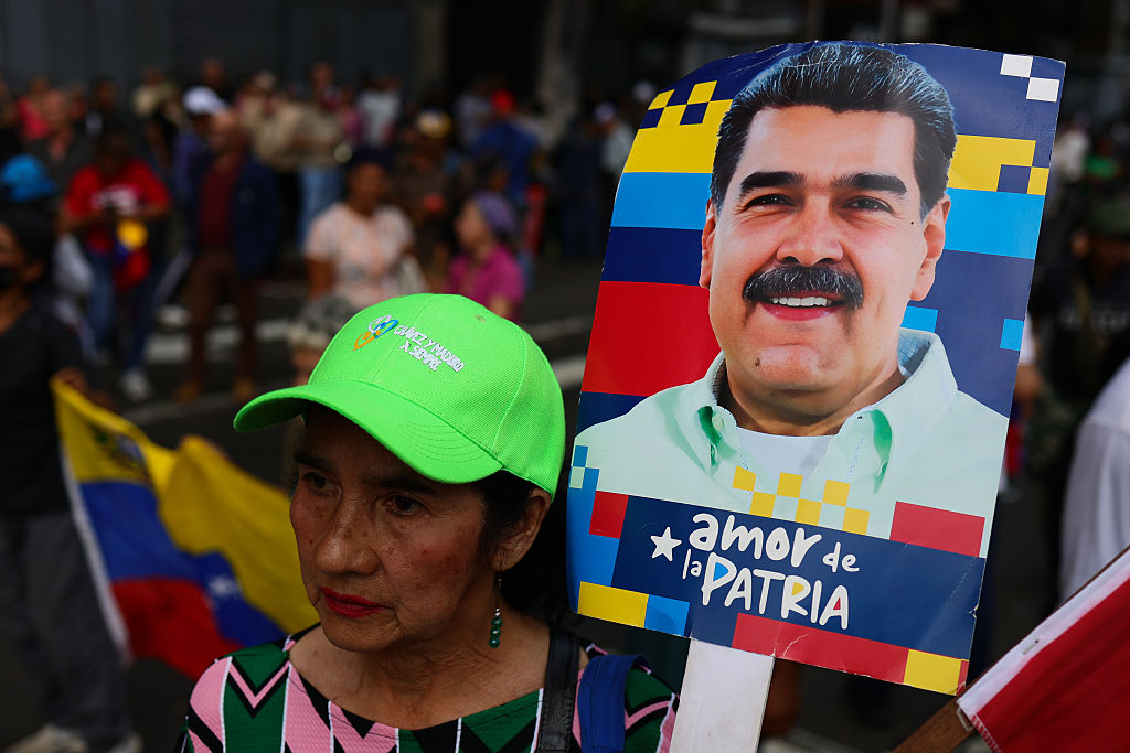03 January 2026, Venezuela, Caracas: Supporters of Venezuelan leader Maduro gather in the city center to protest after US President Trump announced that the Venezuelan president had been captured and flown out of the country. Photo: Javier Campos/dpa (Photo by Javier Campos/picture alliance via Getty Images)