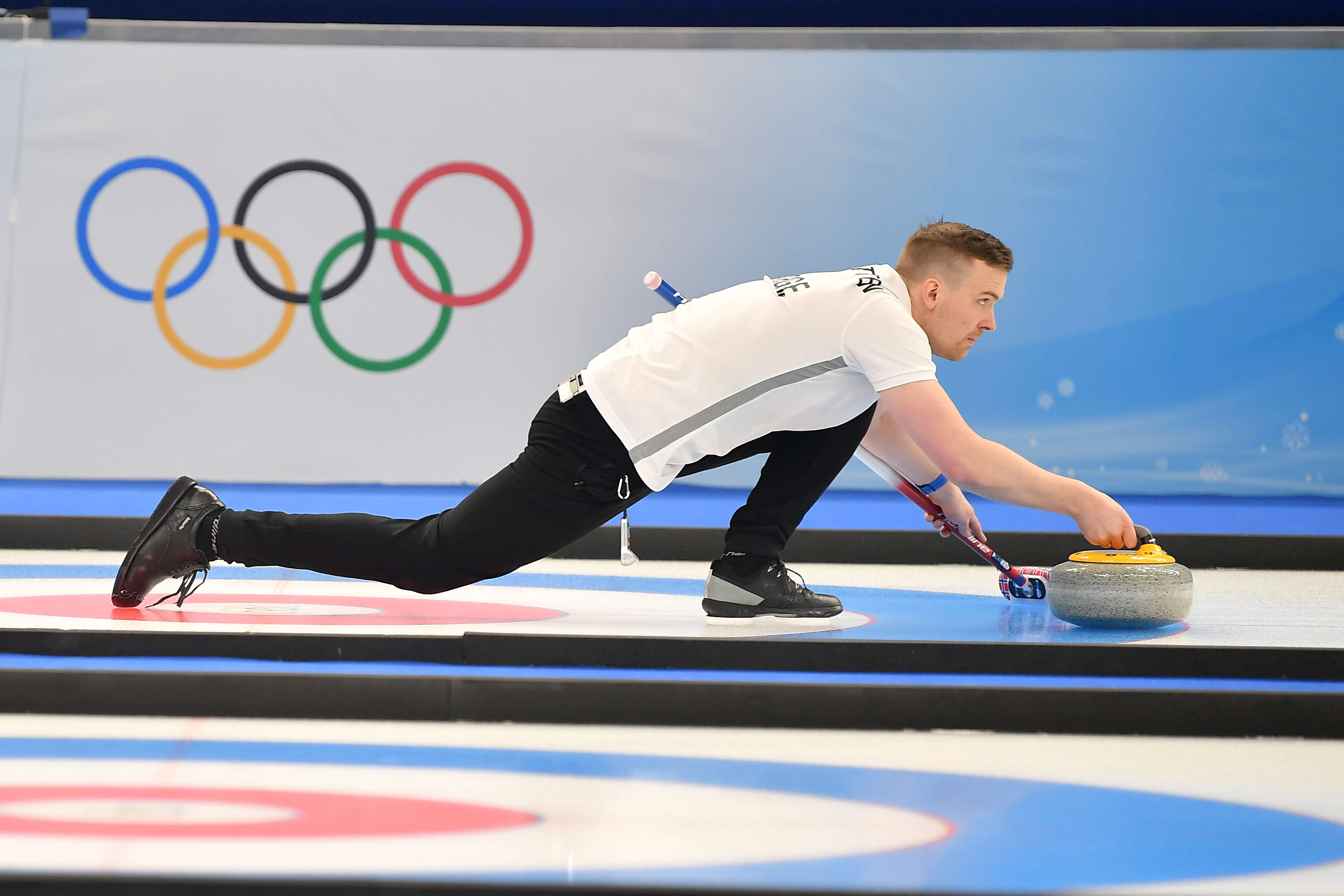 BEIJING, CHINA - FEBRUARY 07: Magnus Nedregotten of Team Norway competes against Team Switzerland during the Curling Mixed Doubles Round Robin on Day 3 of the Beijing 2022 Winter Olympics at National Aquatics Centre on February 7, 2022 in Beijing, China. (Photo by Li Jun/China News Service via Getty Images)