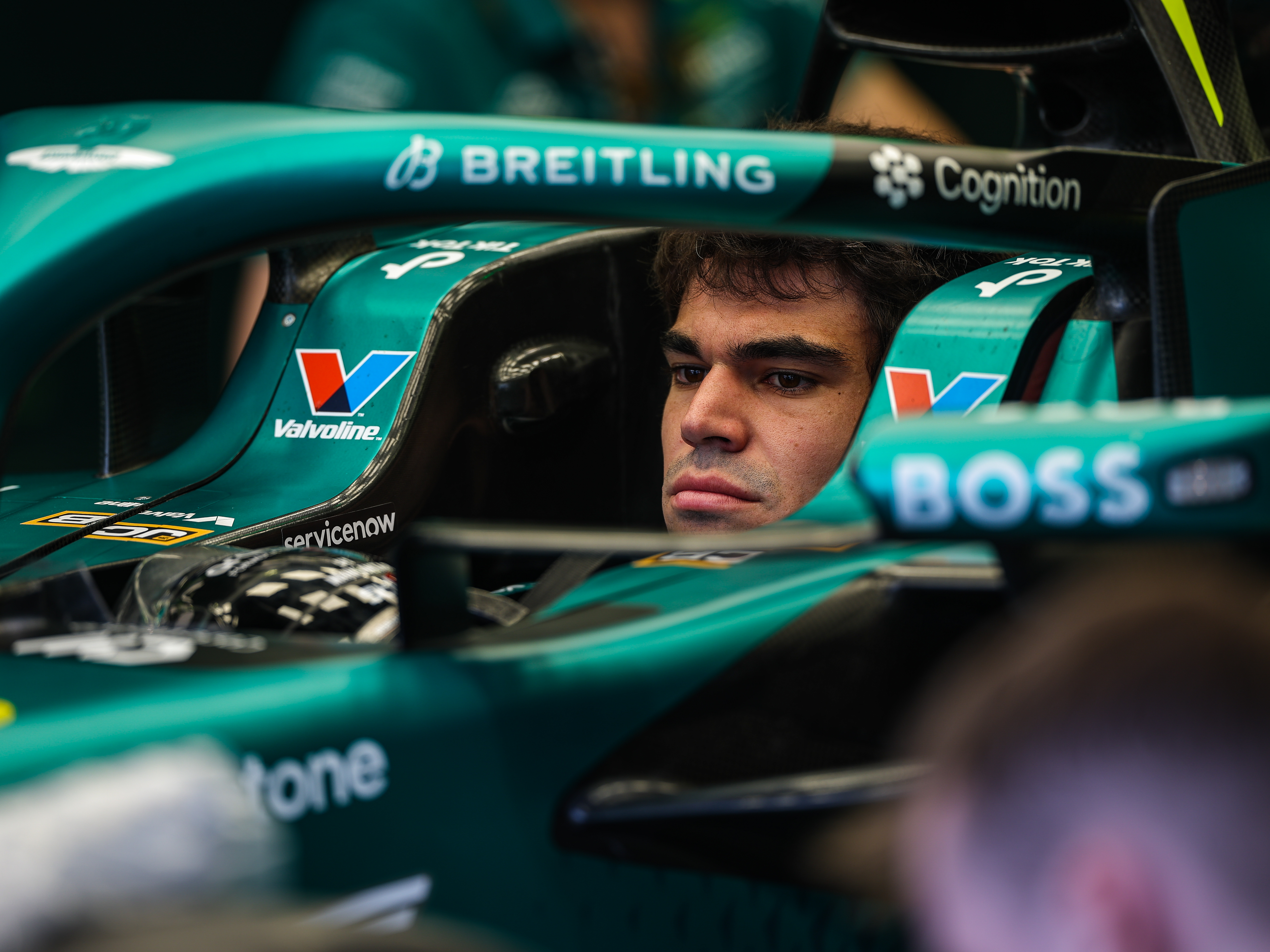 BAHRAIN, BAHRAIN - FEBRUARY 20: Lance Stroll of Canada sitting in the (18) Aston Martin AMR26 in the garage during day three of F1 Testing at Bahrain International Circuit on February 20, 2026 in Bahrain, Bahrain. (Photo by Kym Illman/Getty Images)