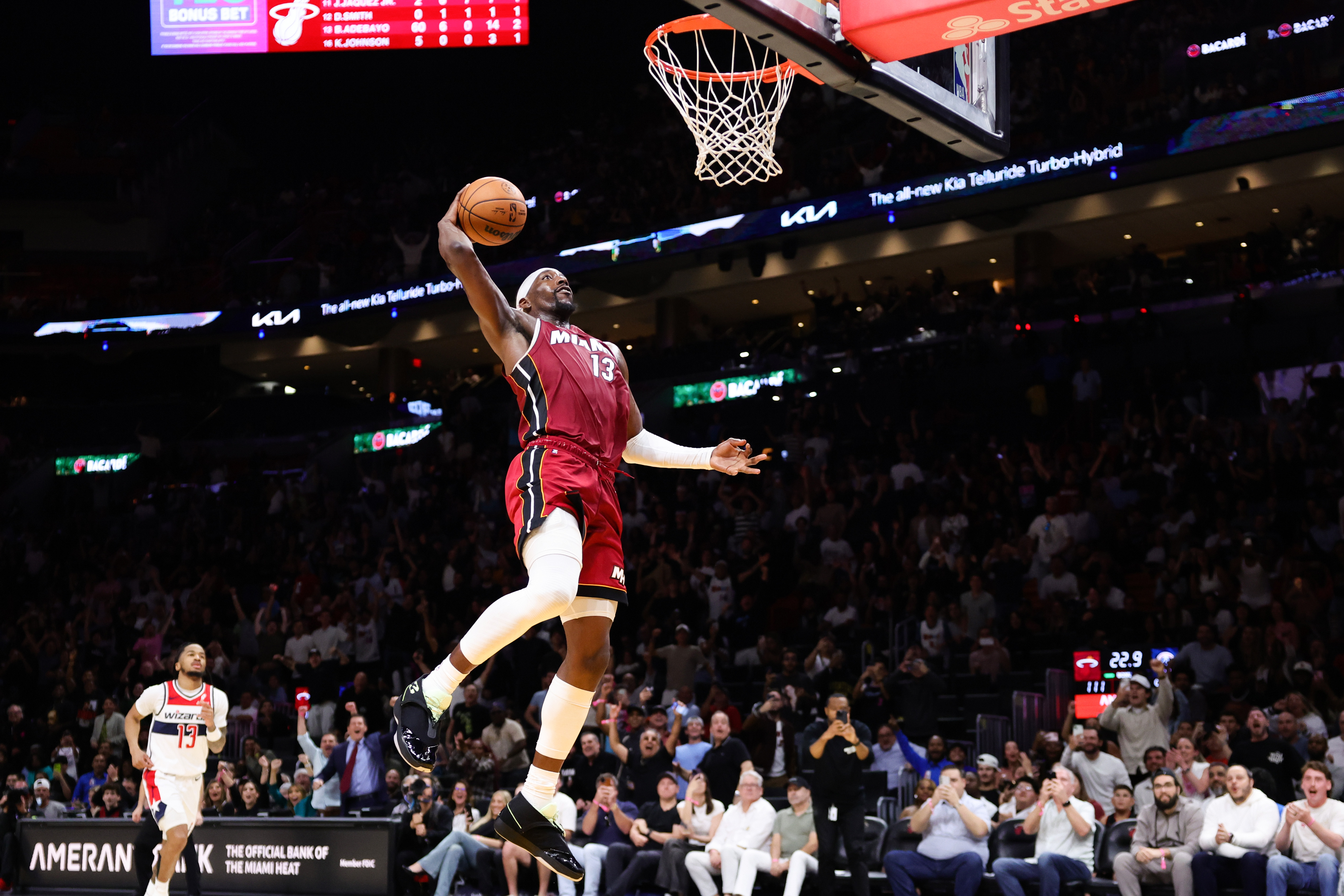 MIAMI, FLORIDA - MARCH 10: Bam Adebayo #13 of the Miami Heat dunks the ball against the Washington Wizards during the third quarter of the game at Kaseya Center on March 10, 2026 in Miami, Florida. NOTE TO USER: User expressly acknowledges and agrees that, by downloading and or using this photograph, User is consenting to the terms and conditions of the Getty Images License Agreement. (Photo by Megan Briggs/Getty Images)