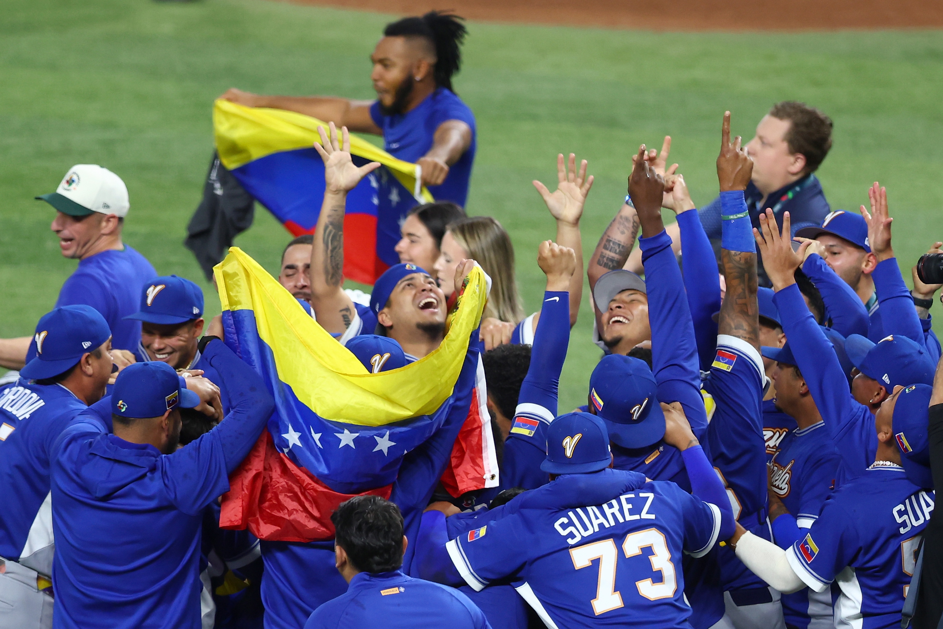 MIAMI, FLORIDA - MARCH 17: Members of Team Venezuela celebrate after the 3-2 victory against Team United States at loanDepot park on March 17, 2026 in Miami, Florida. (Photo by Megan Briggs/Getty Images)