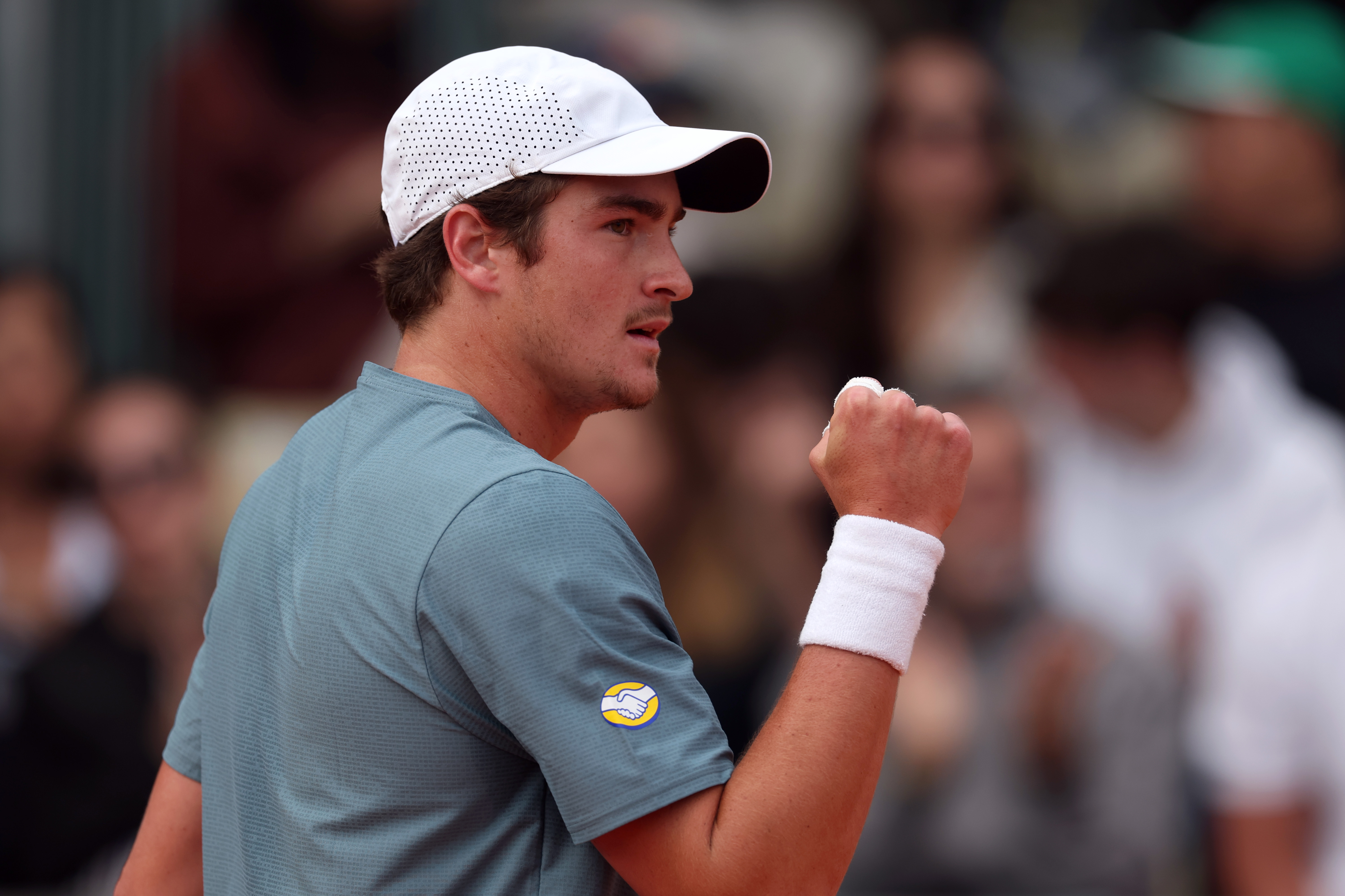 MONTE-CARLO, MONACO - APRIL 06: Joao Fonseca of Brazil reacts against Gabriel Diallo of Canada during their Men's Singles First Round match on day two of the Rolex Monte-Carlo Masters at Monte-Carlo Country Club on April 06, 2026 in Monte-Carlo, Monaco. (Photo by Julian Finney/Getty Images)