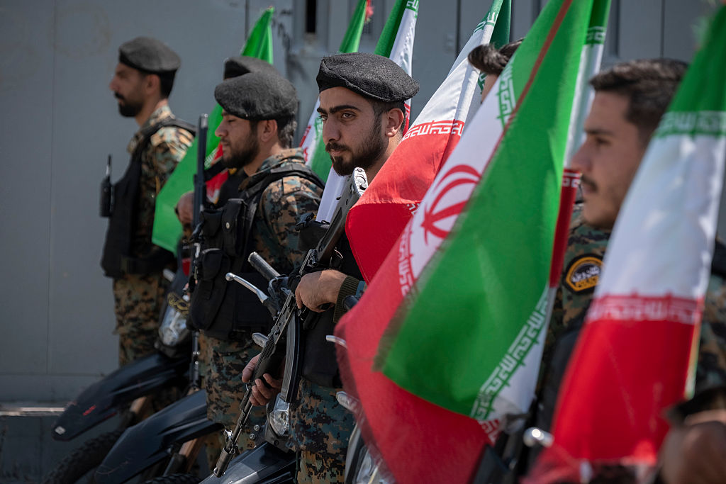 Iranian police officers stand guard outside a square during a pro-government rally commemorating Iran's female fighters, known as the country's self-sacrificing daughters, ahead of a military parade in southern Tehran, Iran, on April 17, 2026, during a ceasefire between Iran and the United States-Israeli coalition. (Photo by Morteza Nikoubazl/NurPhoto via Getty Images)