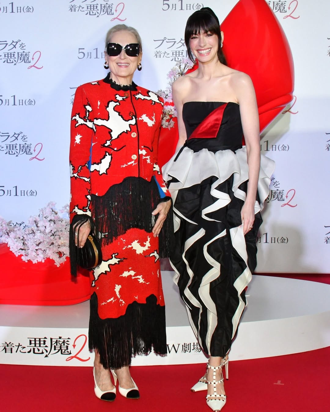 Meryl Streep veste Chanel e Anne Hathaway veste Valentino