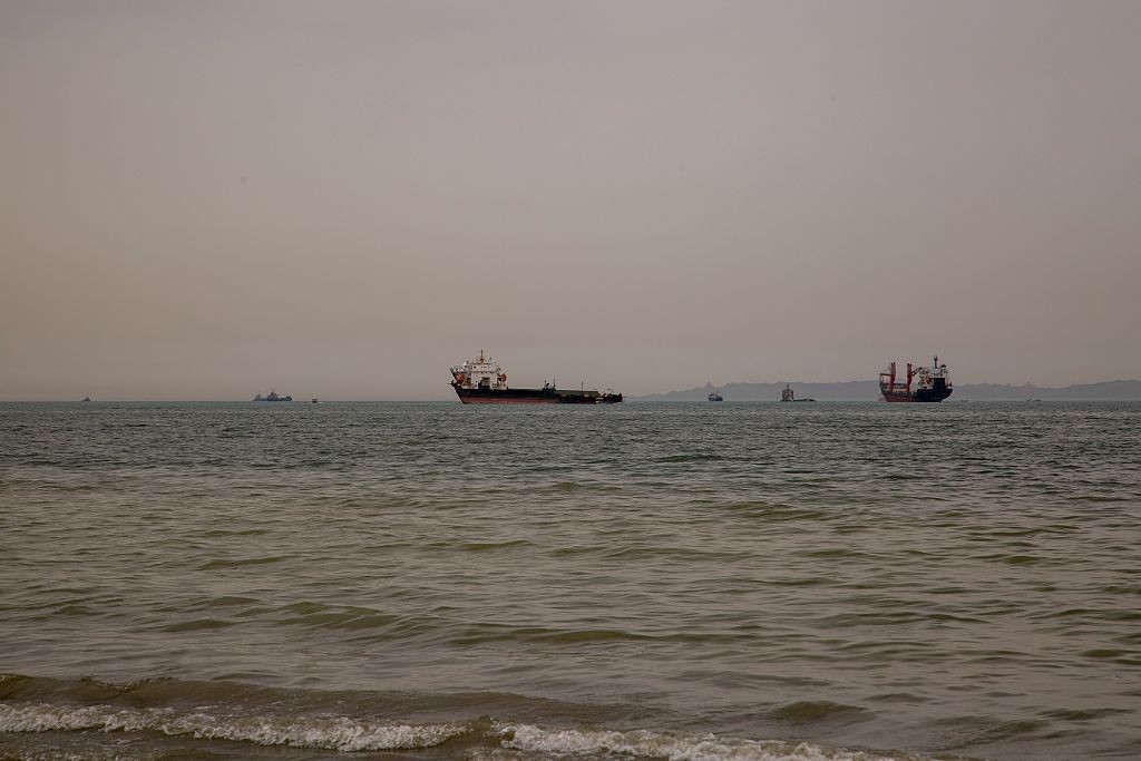 BANDAR ABBAS, IRAN - APRIL 22: Ships are anchored near the shoreline on April 22, 2026 in Bandar Abbas, Iran. Bandar Abbas is a port city and the capital of Hormozgan Province, along the Persian Gulf and Strait of Hormuz. Earlier today, Iran's Islamic Revolutionary Guards Corps said it had attacked and seized two ships near the Strait of Hormuz as it tried to assert control over the critical waterway. The incidents came the day after U.S. President Donald Trump announced an extension of a ceasefire between his country and Iran, and after Iran refused to attend the latest proposed round of peace talks in Islamabad. (Photo by Stringer/Getty Images)