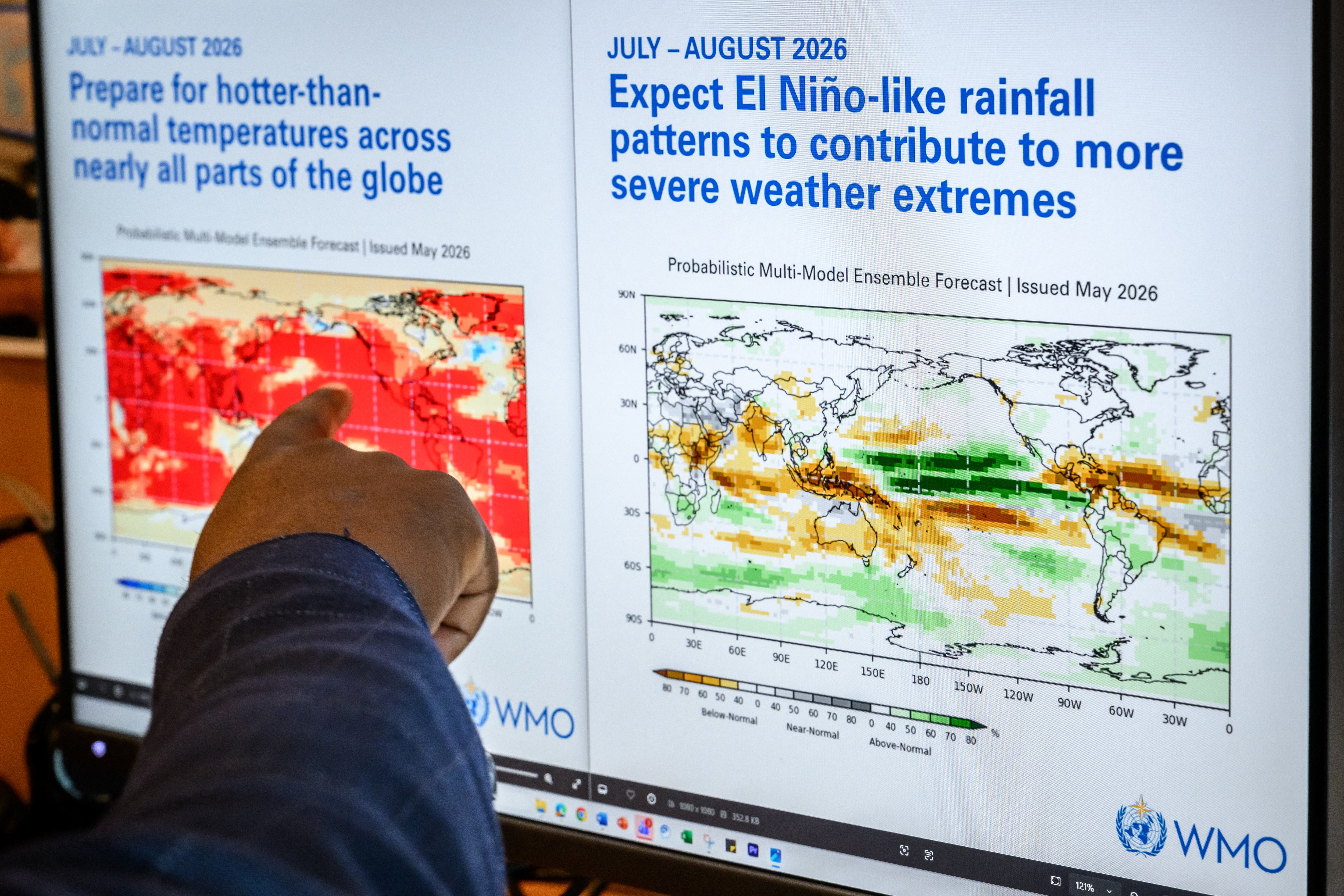 O chefe dos serviços de previsão climática da Organização Meteorológica Mundial (OMM), Wilfran Moufouma-Okia, aponta para gráficos exibidos na tela de um computador na sede da OMM em Genebra, em 1º de junho de 2026.