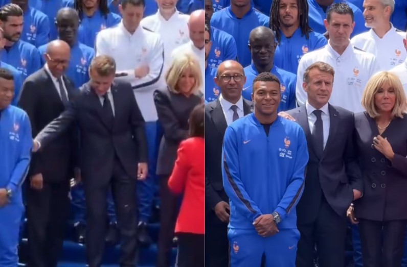 O presidente francês Emmanuel Macron, de terno escuro, e sua esposa Brigitte, de casaco preto, posam com o jogador Kylian Mbappé, de uniforme azul da seleção francesa, e outras pessoas em um evento oficial