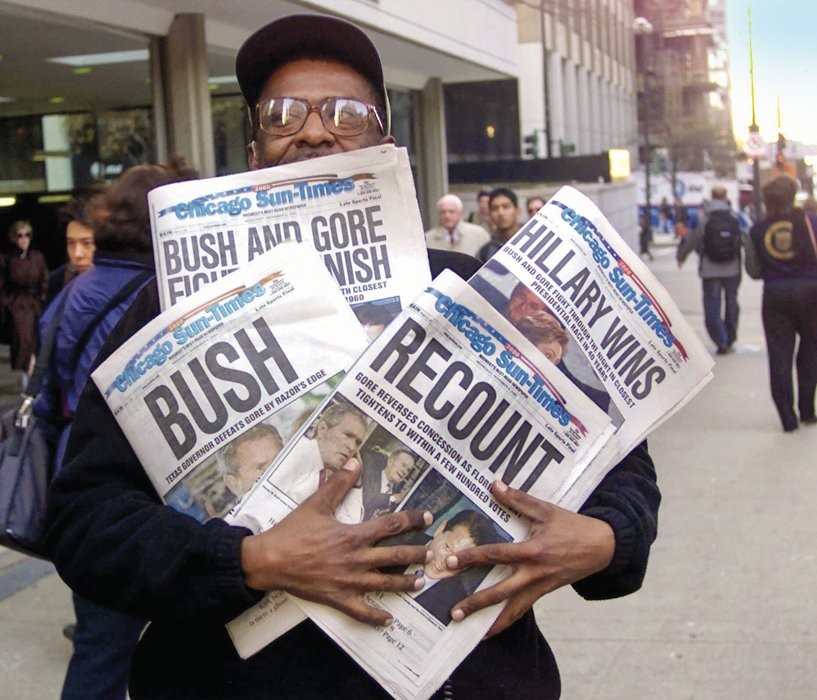 D&Uacute;VIDA -&ensp;Not&iacute;cias de Chicago em 2000: caos no duelo Al Gore x Bush