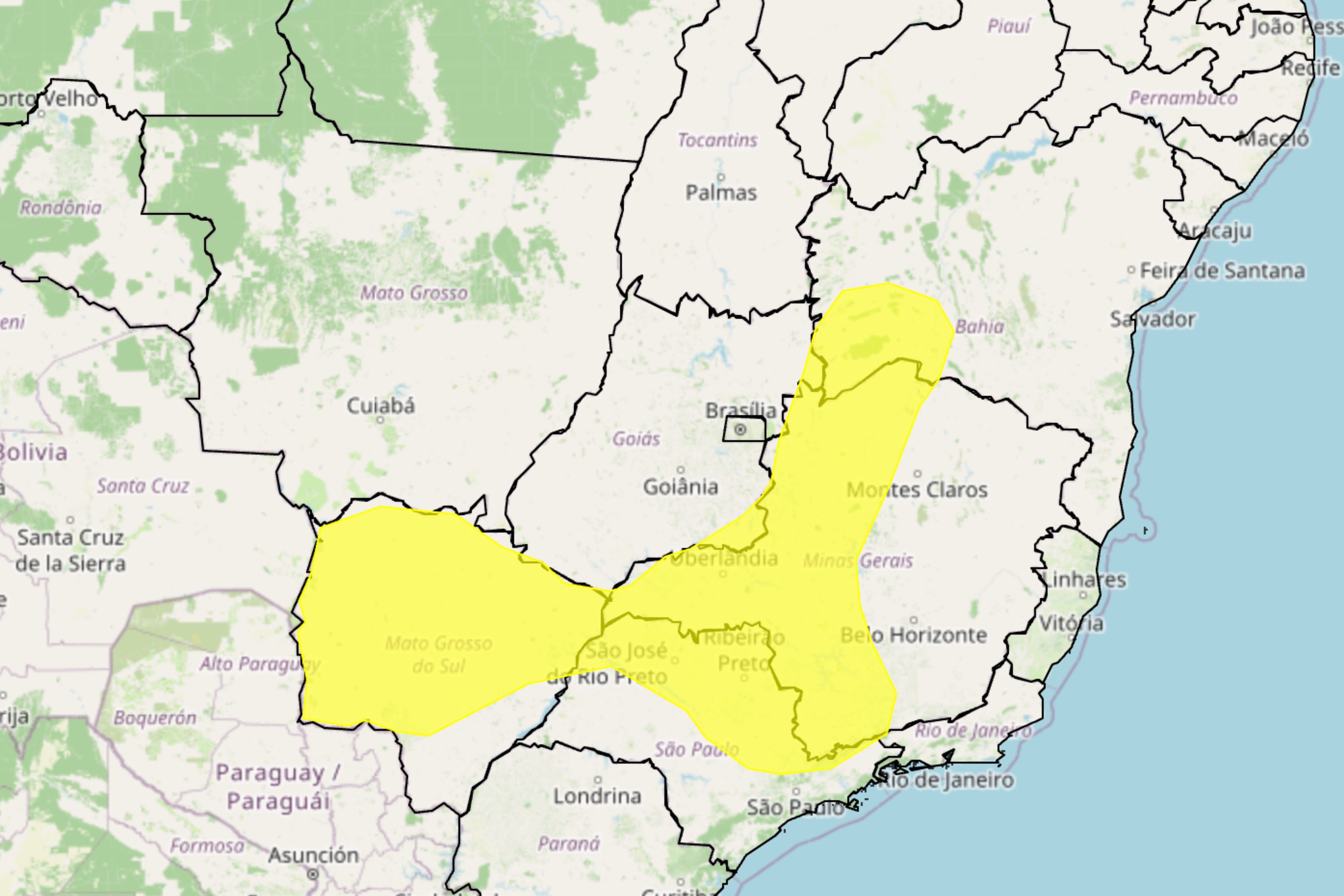 Mapa do Brasil central e sudeste, com área amarela destacando partes de Mato Grosso do Sul, São Paulo, Minas Gerais, Goiás e Bahia, indicando alerta meteorológico