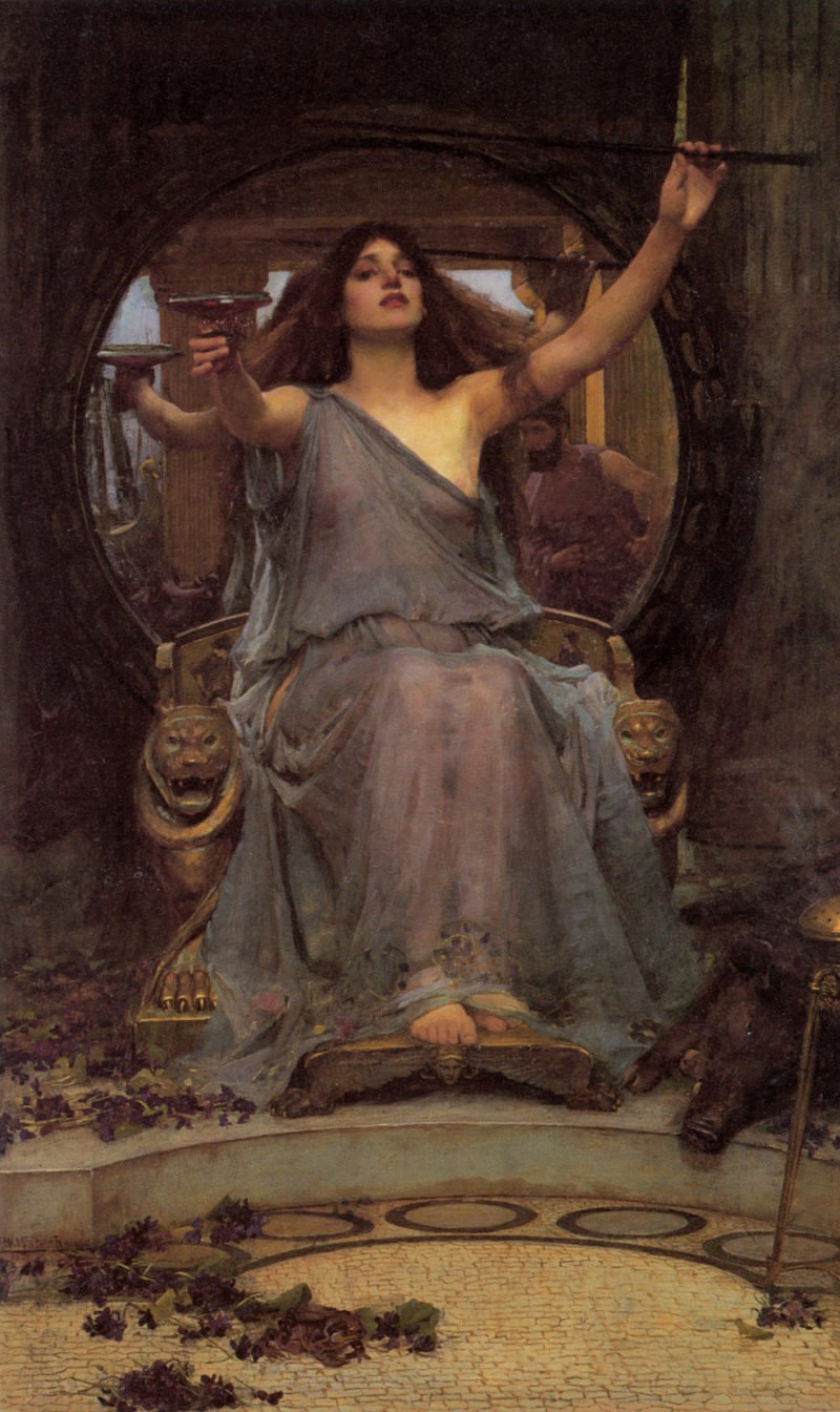 Mulher de cabelos longos e castanhos, vestindo t&uacute;nica azul transl&uacute;cida, sentada em trono dourado com le&otilde;es esculpidos, segurando ta&ccedil;a e varinha, com um porco escuro &agrave; direita e uvas roxas espalhadas no ch&atilde;o