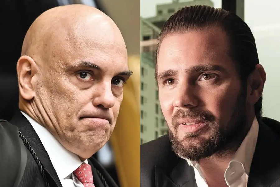 Montagem com dois homens em close-up: à esquerda, um homem calvo de terno e gravata vermelha, com expressão séria; à direita, um homem barbudo de cabelo escuro penteado para trás, vestindo camisa branca e blazer escuro, com leve sorriso