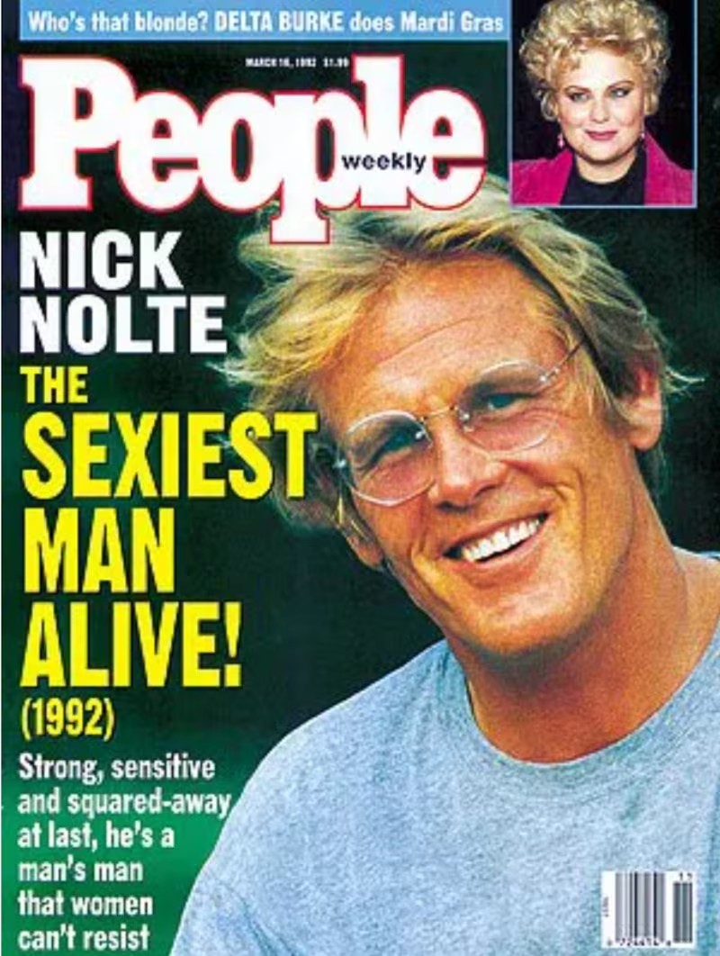 Capa da revista People Weekly de 16 de março de 1992, com Nick Nolte sorrindo, usando óculos e camiseta azul. O título principal é NICK NOLTE THE SEXIEST MAN ALIVE! (1992). No canto superior direito, há uma foto menor de Delta Burke com cabelo loiro encaracolado e blazer rosa